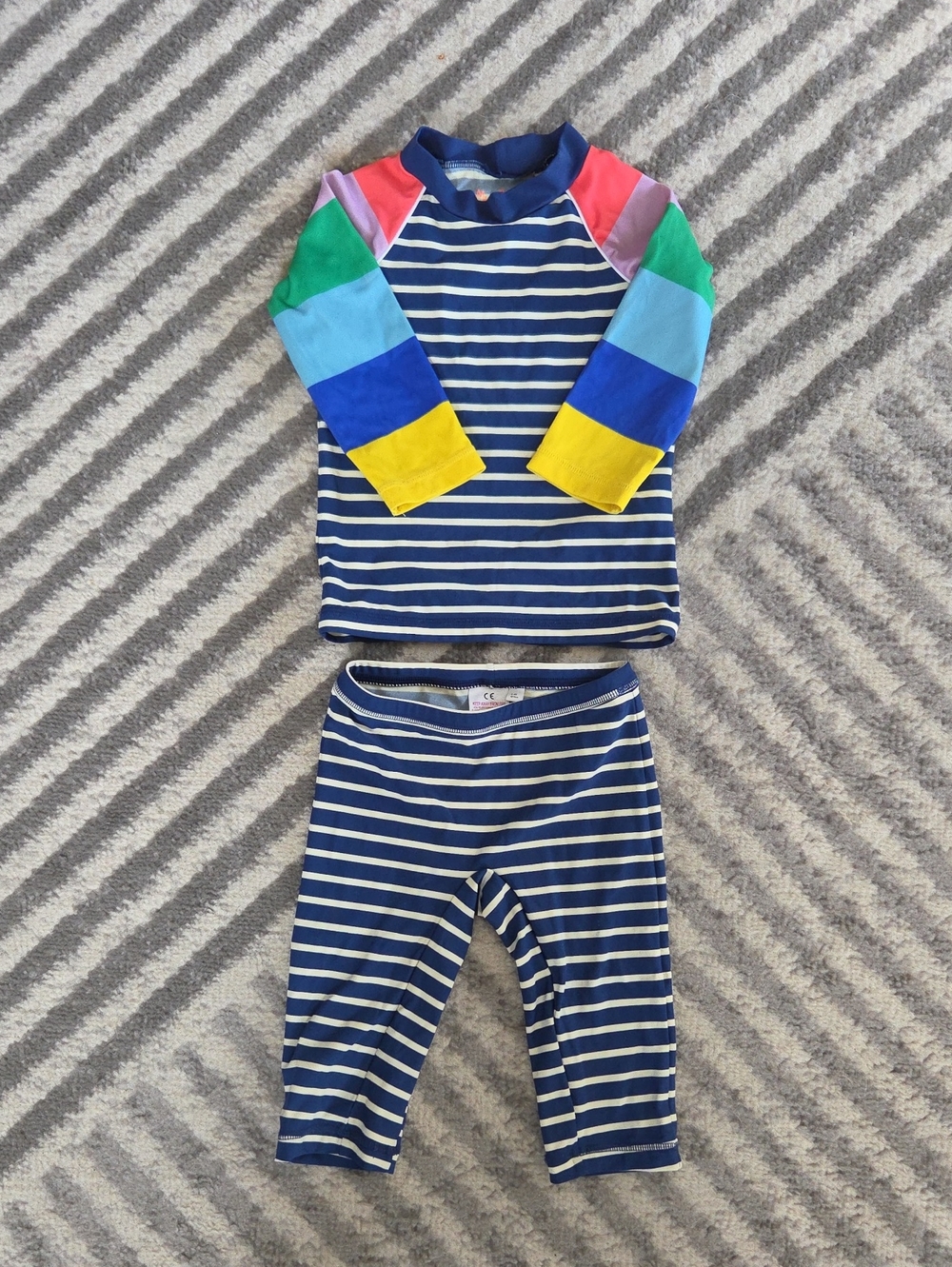 Mini Boden Navy and White Striped Rash Guard with Coral Logo Accent
